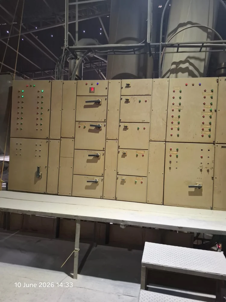 Process-plant control panel with operator platform and overhead cable trays